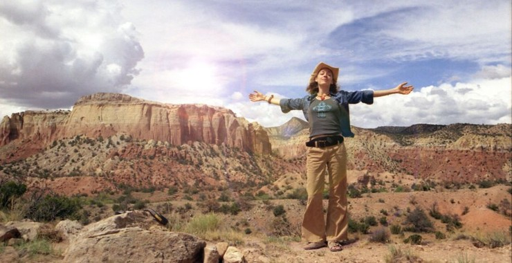 Vegan Movie Poster for Crazy Sexy Cancer showing a woman in the western united states on a desert plateau with her arms open wide